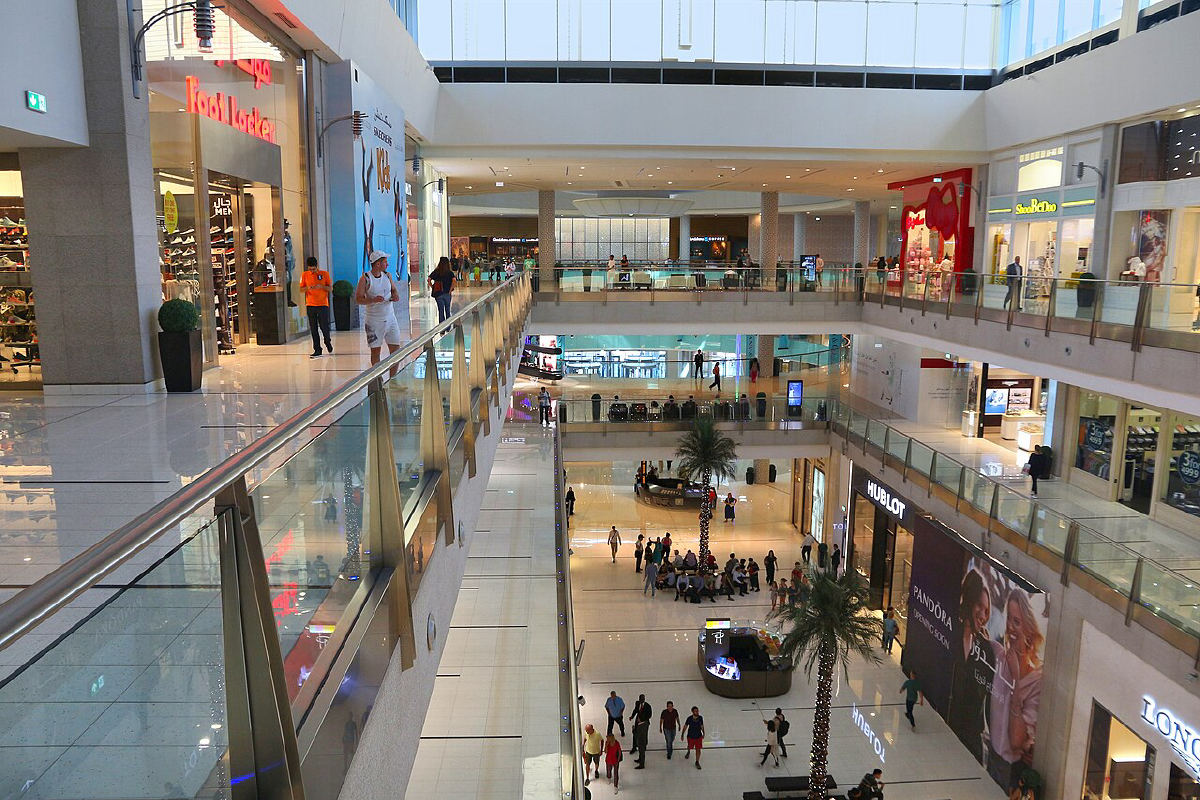 Inside The Dubai Mall with palm trees