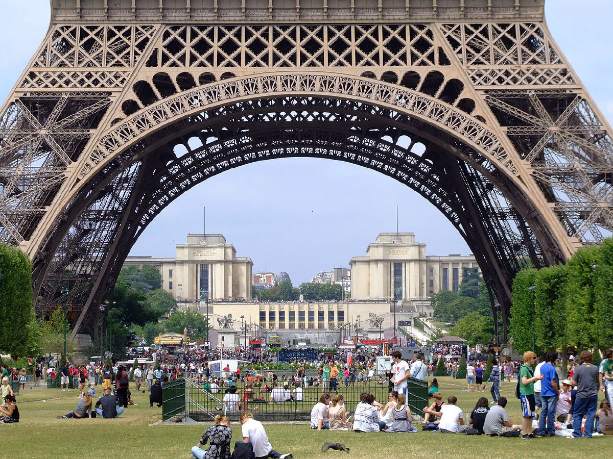 The Eiffel Tower rising above the Seine and Pont des Invalides